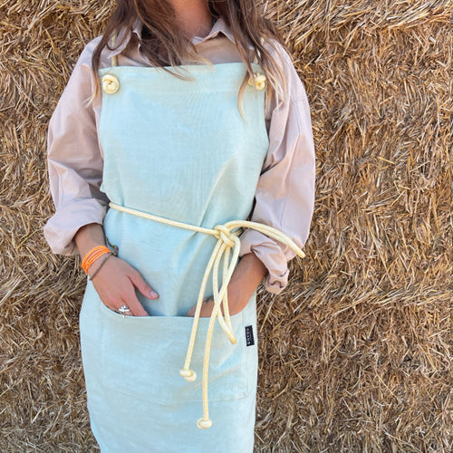 Green linen apron