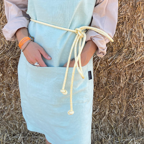 Green linen apron