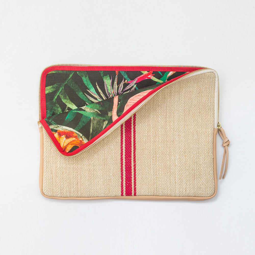 MacBook cover handcrafted  from a 100 years old grain sack and Spanish leather .