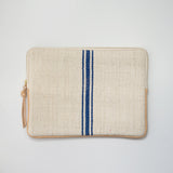 MacBook cover handcrafted  from a 100 years old grain sack and Spanish leather .